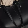 Édition Cyme Noir texturé avec coutures écrues